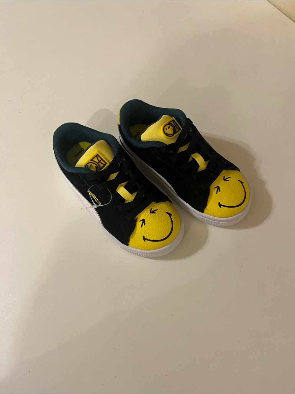 Puma Kids Black and Yellow Smiley Toe Sneakers